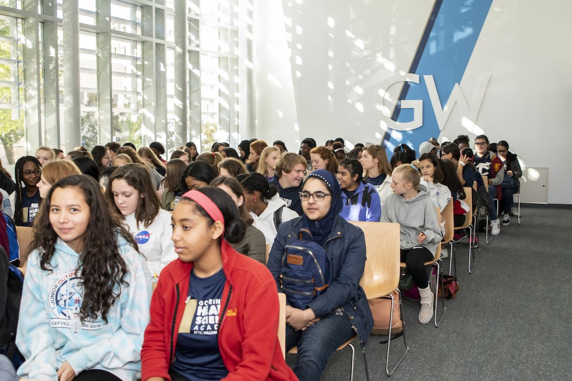 students sit in a room in Arlington Campus